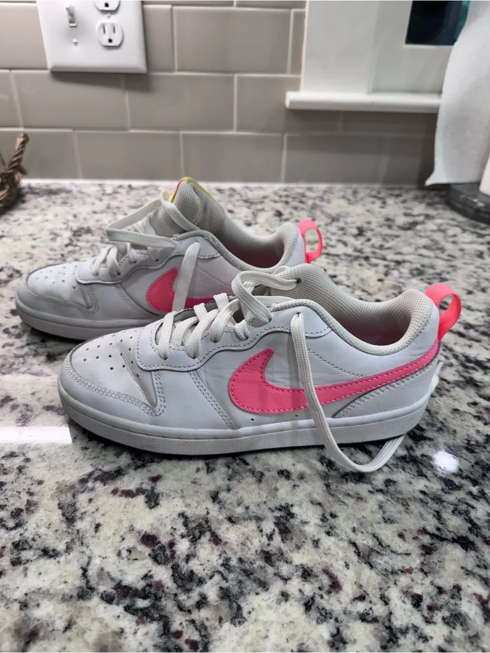 Nike Kids White Sneakers with Pink Swoosh and Coral Heel Tab